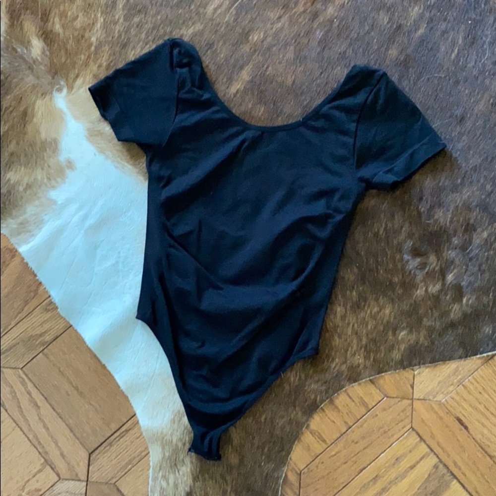 Black shirt sleeve open back onsie